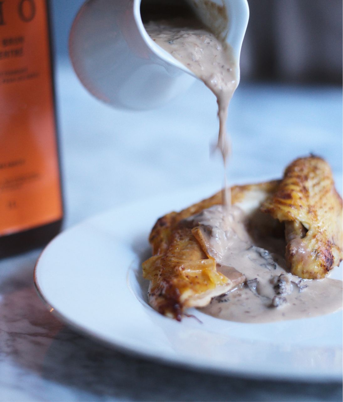 Duck thighs in orange sauce