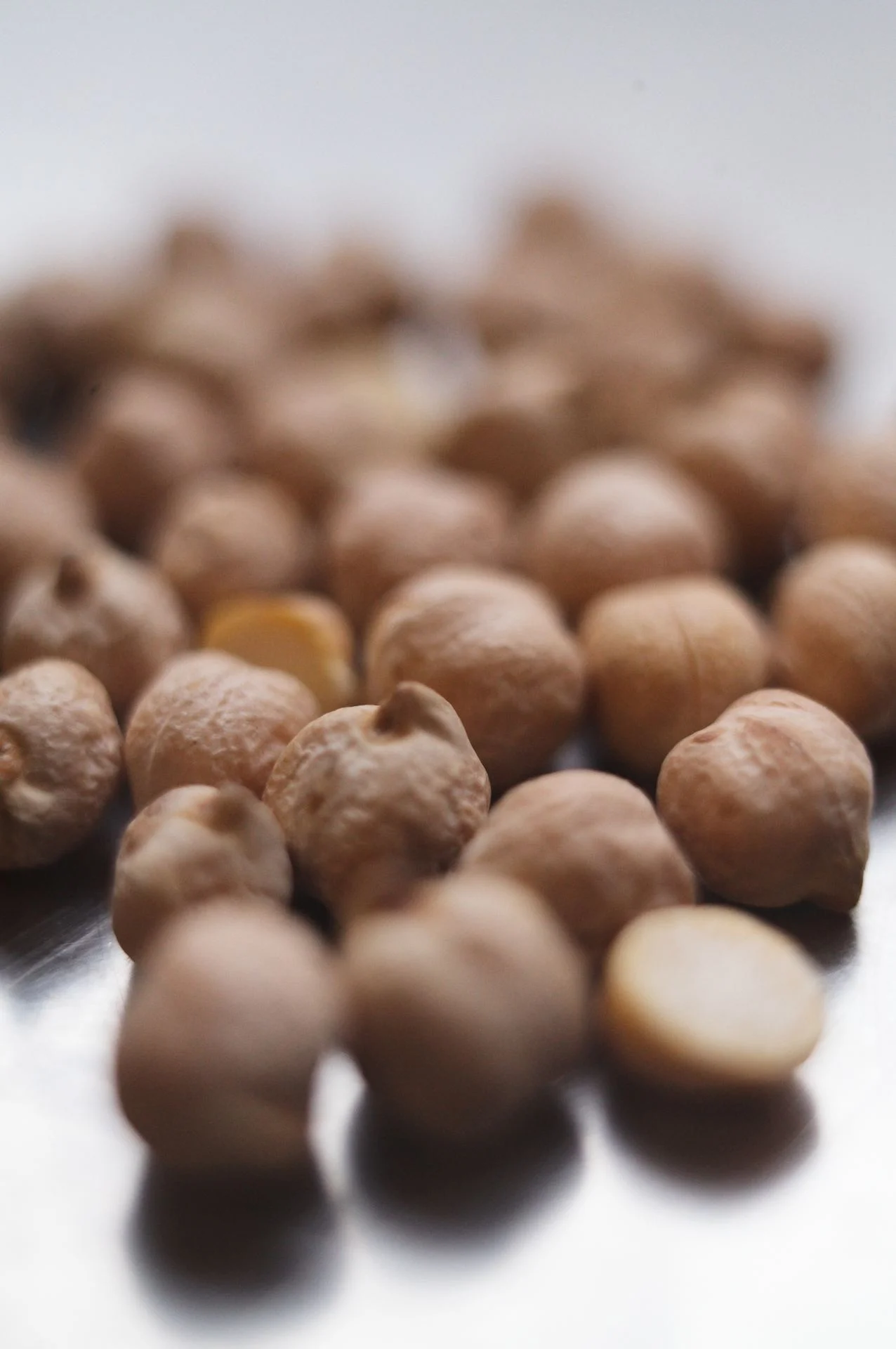 Close-up of raw chickpeas illustrating the industry gap between food scale and culinary depth